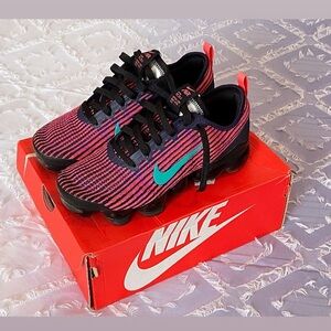Nike Flyknit Sneakers in Pink and Black with Teal Swoosh